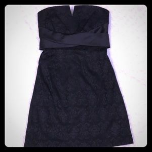 White House Black Market  Black strapless dress.